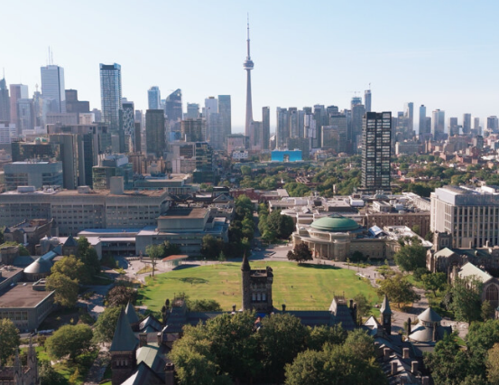 Aerial view of St. George campus with the city of Toronto in the background