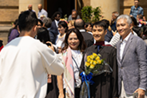 A family gets their photo taken.
