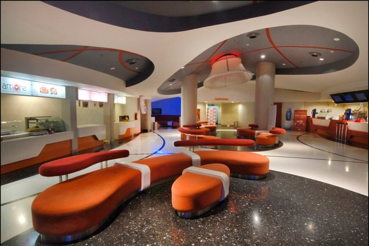 a curvy movie theatre in mumbai