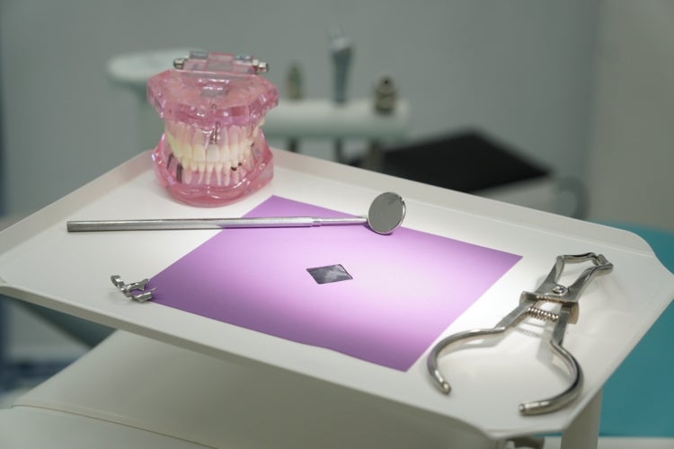 the comfidam breatable rubber dam is a retangular rubber sheet with a breathable hole in the centre