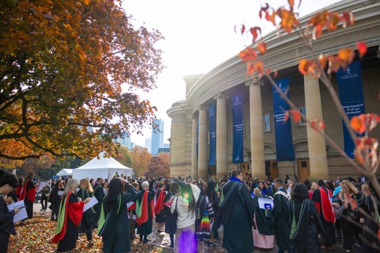 outside convocation hall with fall leaves on the trees visible