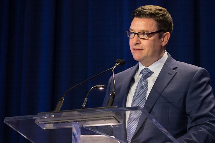 David Wright speaks at a podium