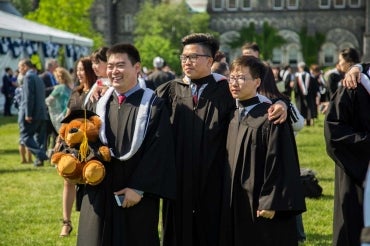 photo of UTM grads on front campus