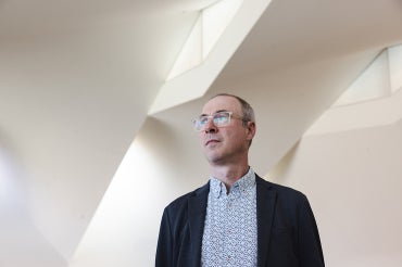Mason White stands inside the Daniels Building on the St. George campus.