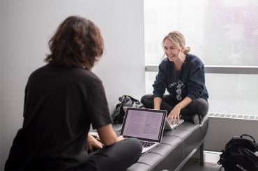 Photo of students on their computers