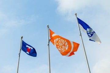 The Orange Shirt Day flag flies at Varsity Arena at the University of Toronto