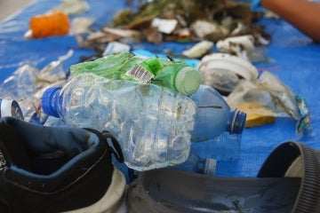 plastic water bottles and other trash collected by the trash team