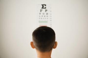 boy taking an eye exam