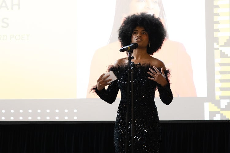 Hannah Flores performs during the Black Grad ceremony