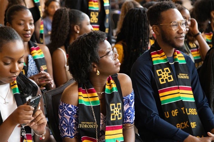 students are seen waiting anxiously and excitedly during the Black grad ceremony