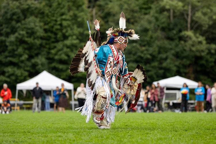 Dan Secord performs a dance during the powwow