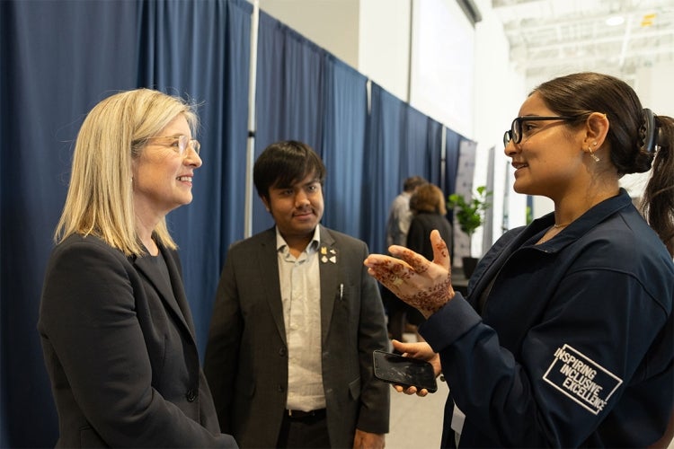 Woodin speaks with&nbsp;Riya Osti and Arjun Singh Yanglem at U of T Scarborough